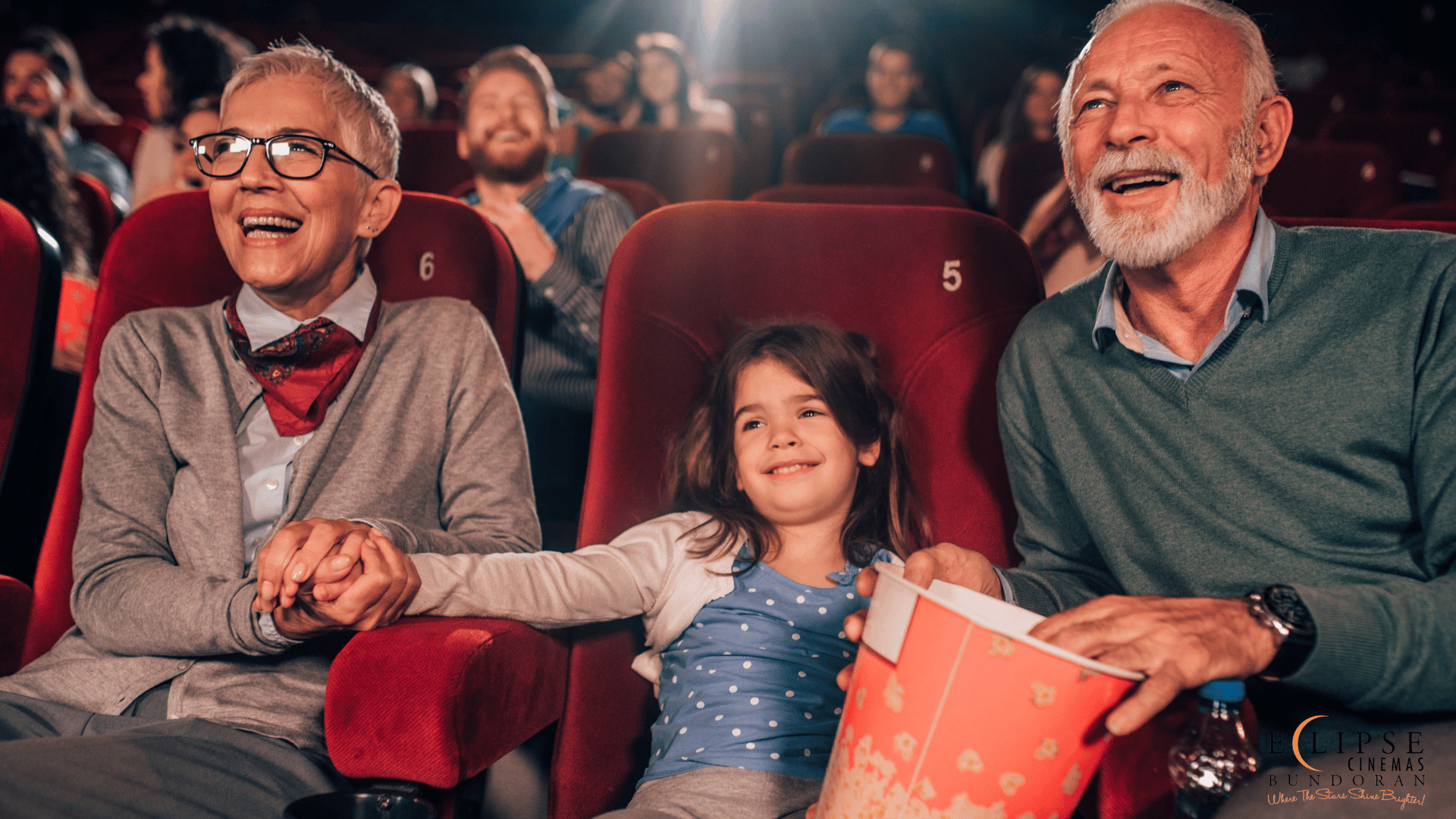 family Enjoyinh a film in Eclipse Cinemas 